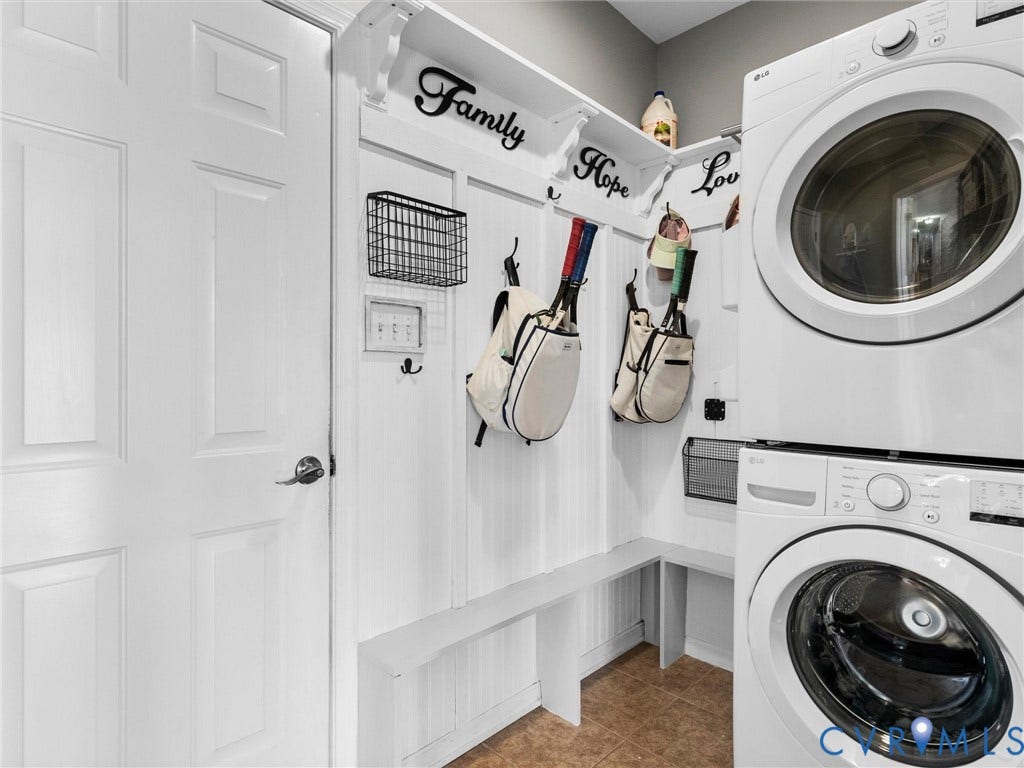 Laundry room/drop zone conveniently located off the garage