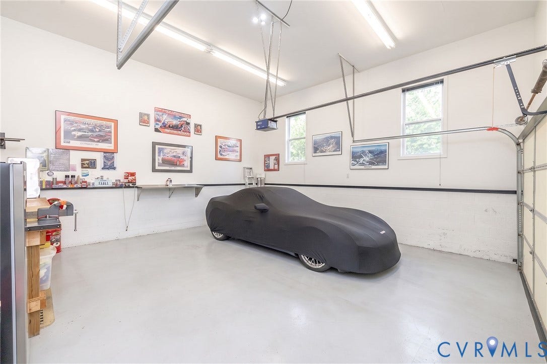 Large 2 car garage with work bench