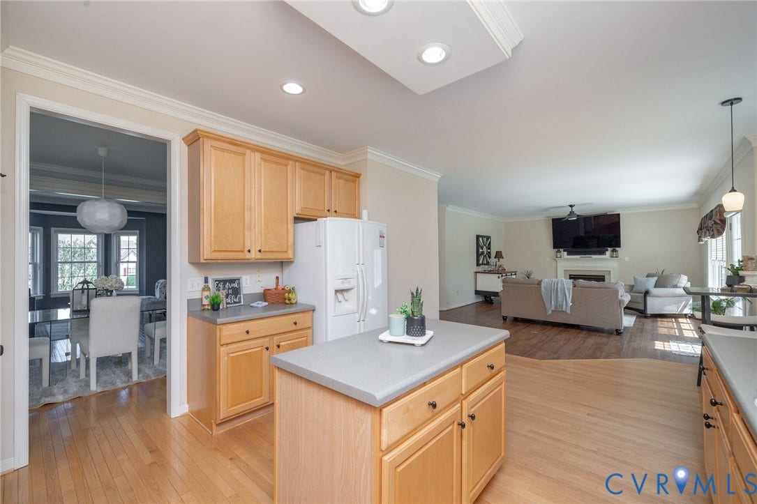 Spacious with 42-inch wood cabinets and island.