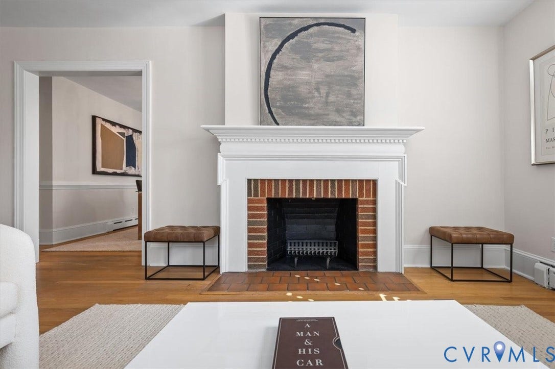 613 Maple Avenue, Near West End, Richmond, VA 23226 Fireplace with a white mantel, brick surround, and hearth