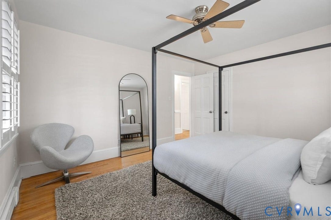613 Maple Avenue, Near West End, Richmond, VA 23226 Hardwood flooring, plantation shutters, ceiling fan, and white paneled door