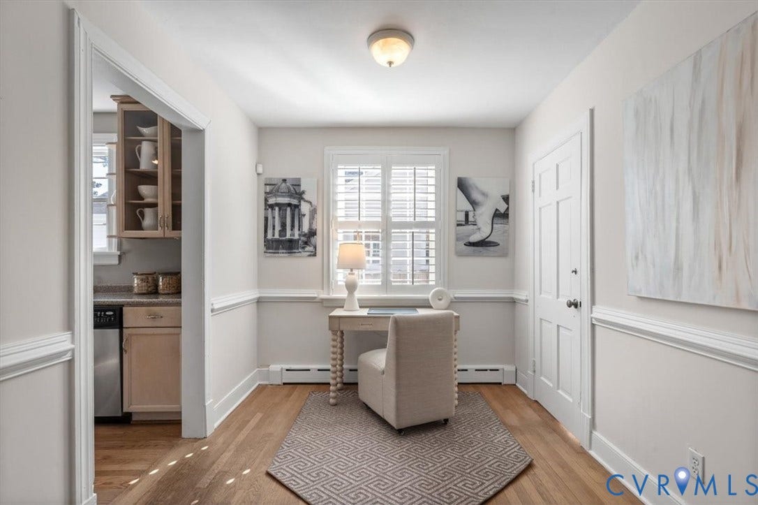 613 Maple Avenue, Near West End, Richmond, VA 23226 Wood-finish flooring with white baseboards and chair rail molding