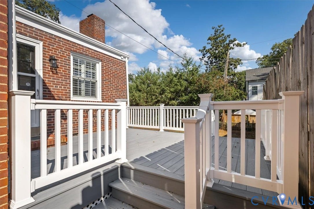 613 Maple Avenue, Near West End, Richmond, VA 23226 Expansive deck featuring white railings, gray decking, and multi-level design