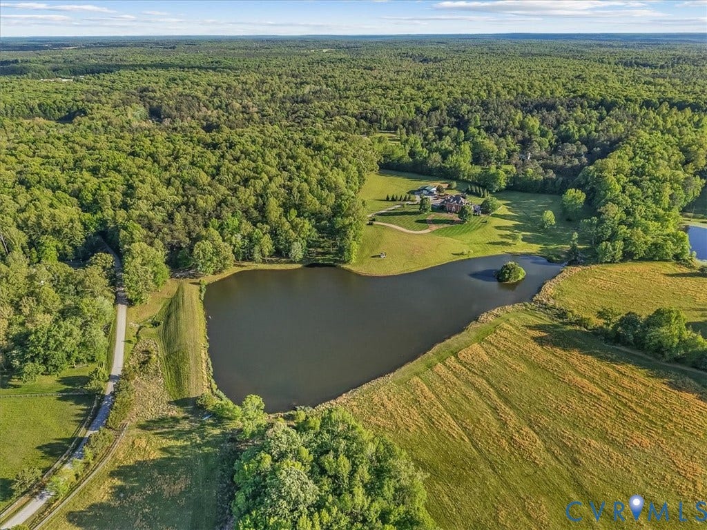 12427 Killigay Lane, Maidens, VA 23102 Just a 2 minute walk or golf cart ride to the lake stocked with small mouth bass and blue gill.