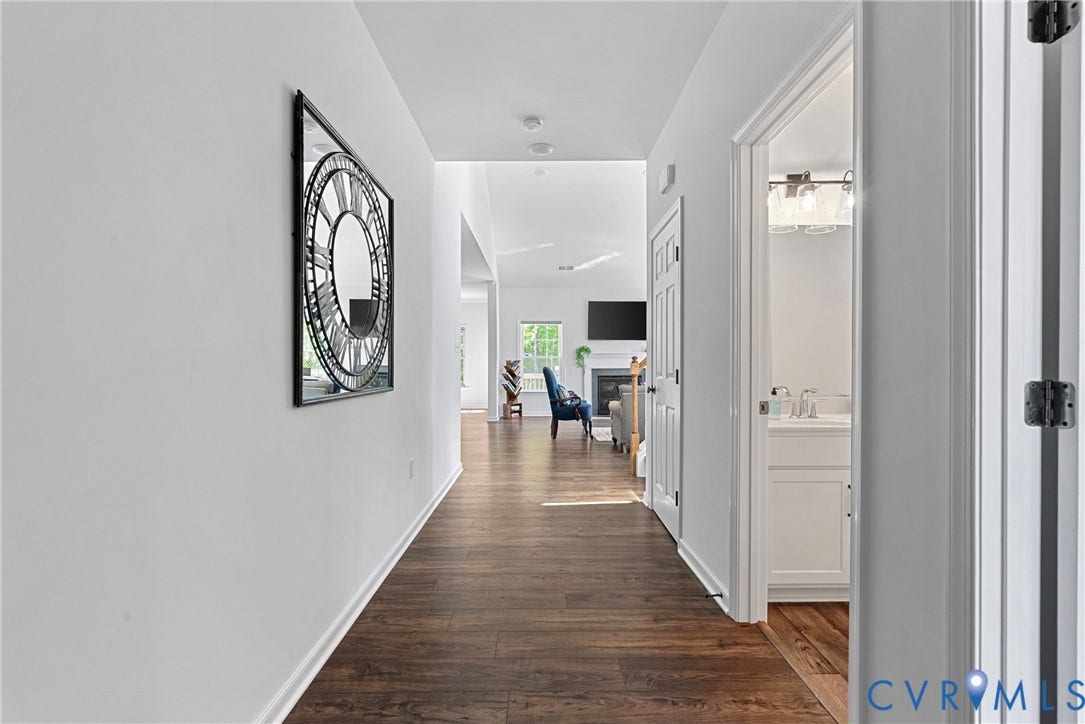 1605 Reed Marsh Place, Reed Marsh, Goodview, VA 23063 Hallway featuring wood-finish flooring, white walls, and a recessed lighting