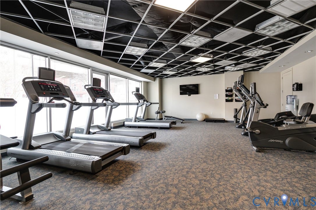 301 Virginia Street, #U804, Downtown, Richmond, VA 23219 Exercise room overlooks the Canal and turning basin.