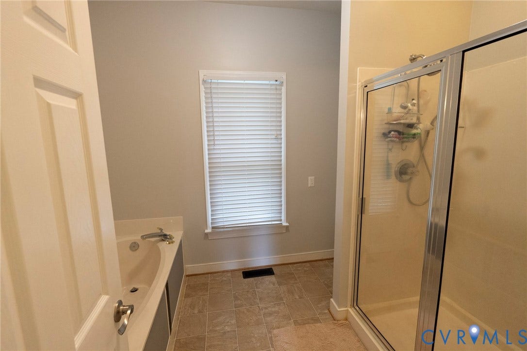 1670 Mill Quarter Road, Powhatan, VA 23139 First floor primary bath shower, soaking tub