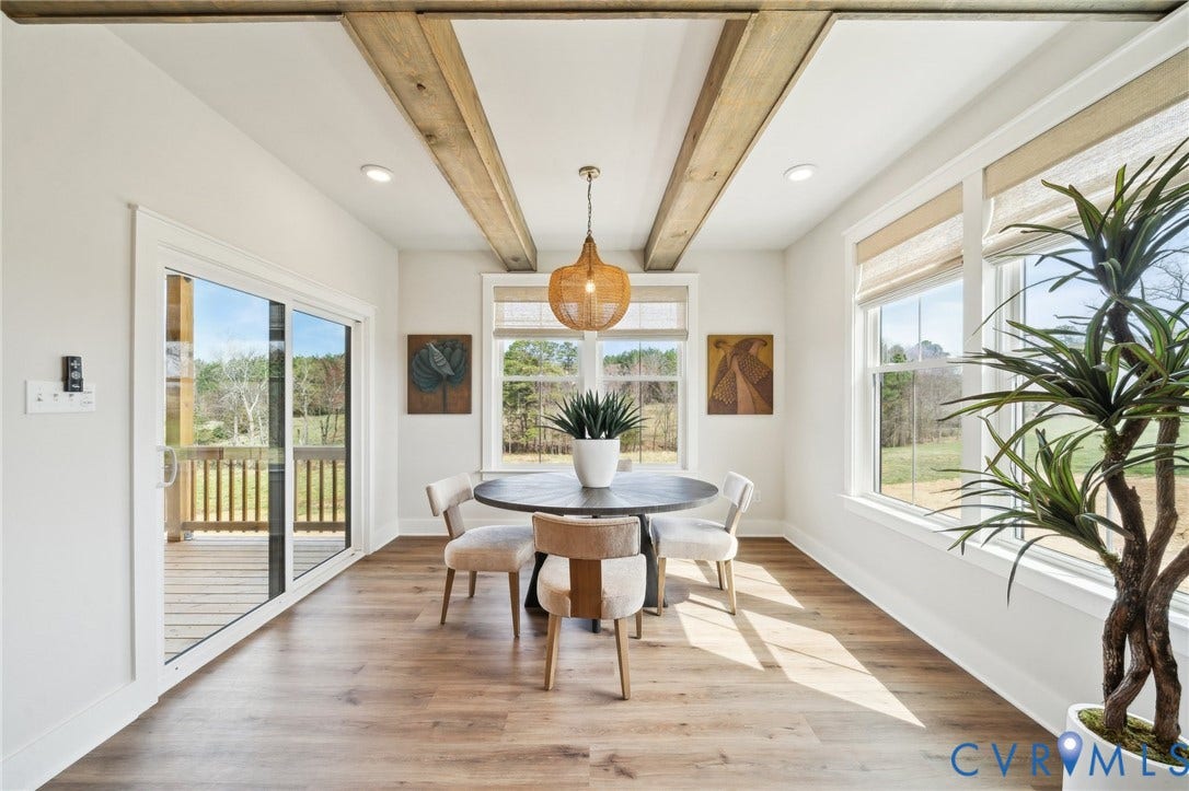 Near kitchen, optional beams shown. Photo of model home.