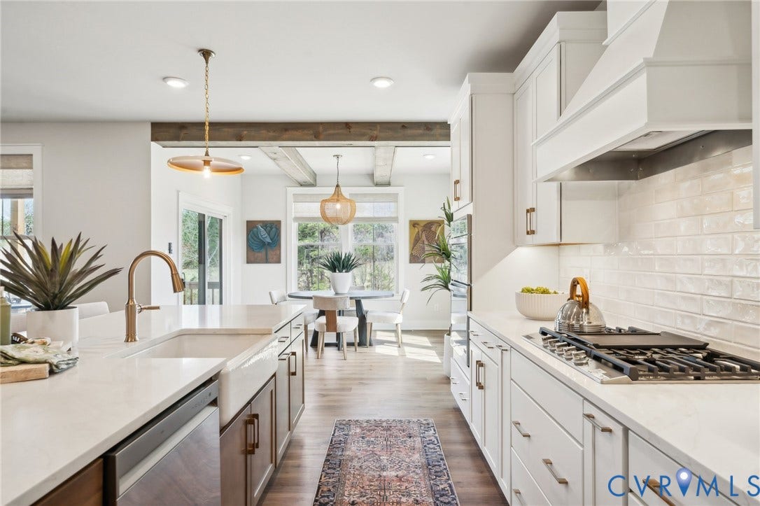 View to dinette area to left. Photo of model home.