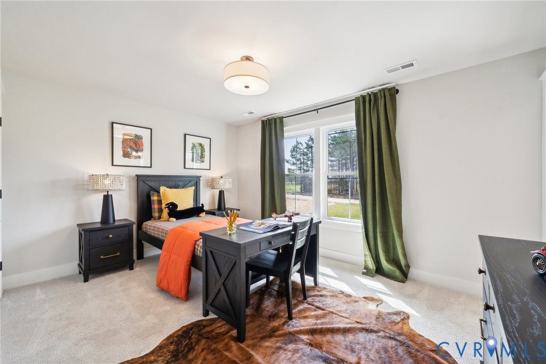Bedroom 3. This bedroom can have an en suite, optionally. Photo of model home.