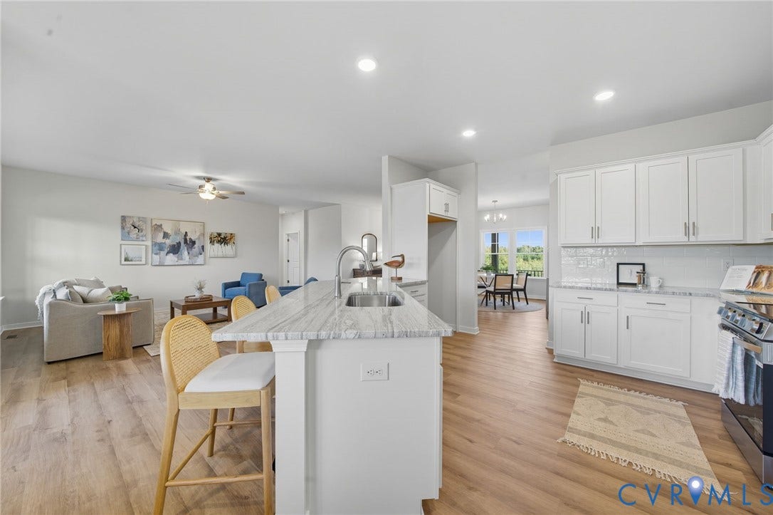 TBD Buckners (Lot 21) Lane, Compass Cove, Mineral, VA 23117 Views of family room and dining room. Staged home
