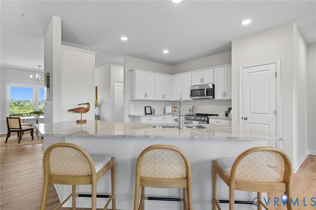 TBD Buckners (Lot 21) Lane, Compass Cove, Mineral, VA 23117 The island will NOT be angled in this home. See the floor plan within the photos. Staged home