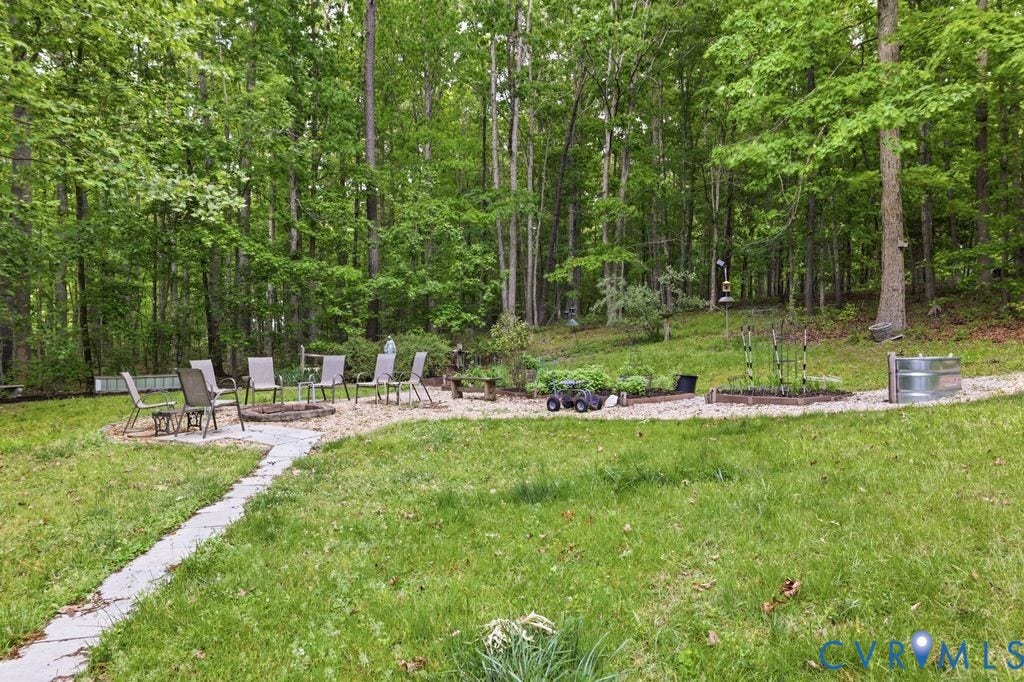 1061 Turkey Ridge Drive, Powhatan, VA 23120 raised beds & fire pit