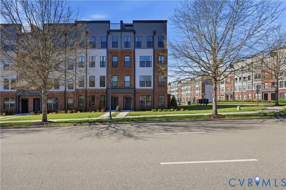 13208 Brattice Loop, 2510, Midlothian, VA 23114 Contemporary multi-level townhome featuring a brick and siding facade with dark trim windows