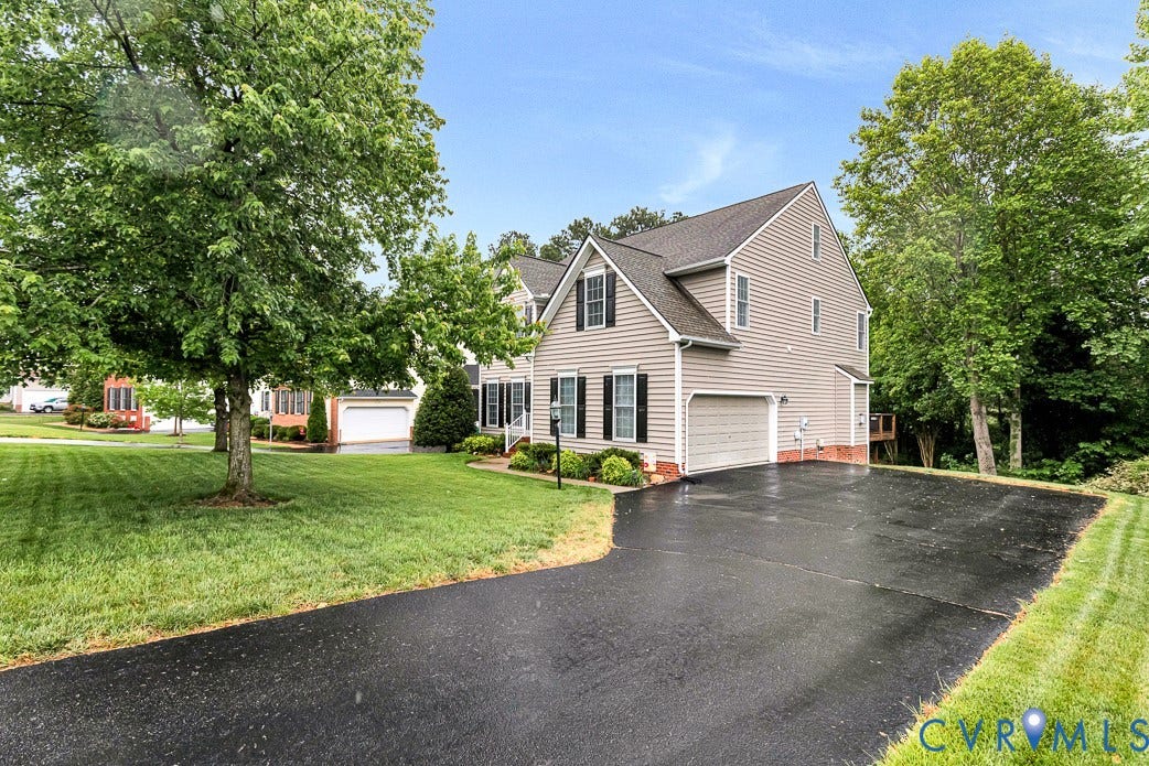 5841 Dorton Lane, Carrington, Glen Allen, VA 23060 Double wide paved driveway to two car side entry garage.