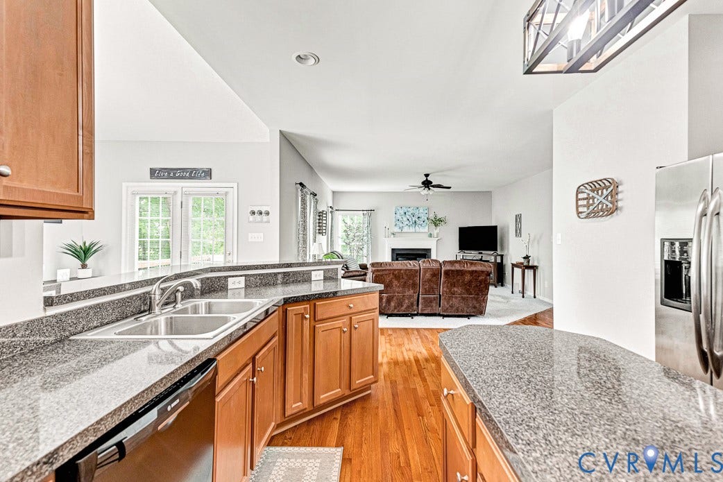 5841 Dorton Lane, Carrington, Glen Allen, VA 23060 Kitchen looking towards the doors to the deck and into the family room.