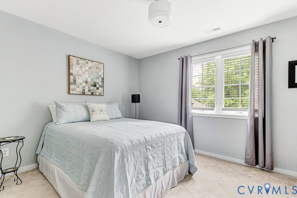 5841 Dorton Lane, Carrington, Glen Allen, VA 23060 Bedroom three with carpet and a nice view of the back yard.