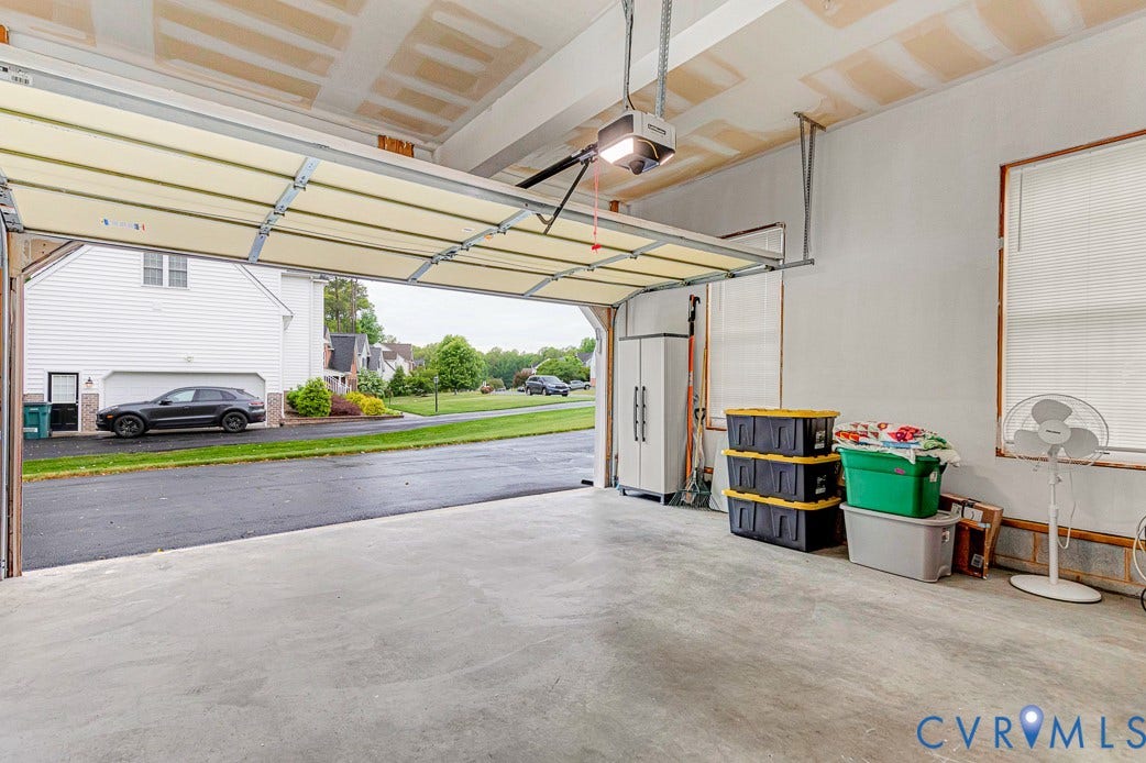 5841 Dorton Lane, Carrington, Glen Allen, VA 23060 Another view of the garage. The newer door opener is very quiet and even has a security camera.