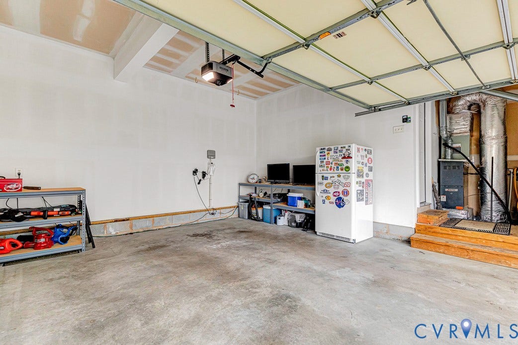 5841 Dorton Lane, Carrington, Glen Allen, VA 23060 Large two-car, side-entry garage. Good place to enjoy the game, extra storage or keep your cars out of the weather.