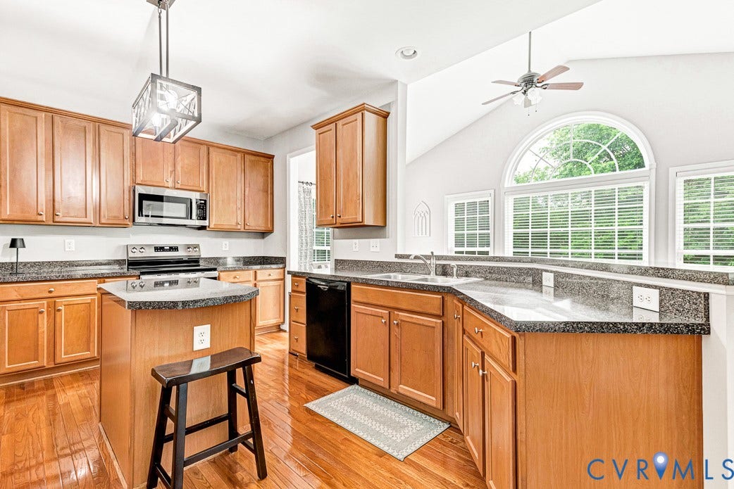 5841 Dorton Lane, Carrington, Glen Allen, VA 23060 The kitchen has lots of cabinets and counter space. The breakfast room brings in lots of natural light.