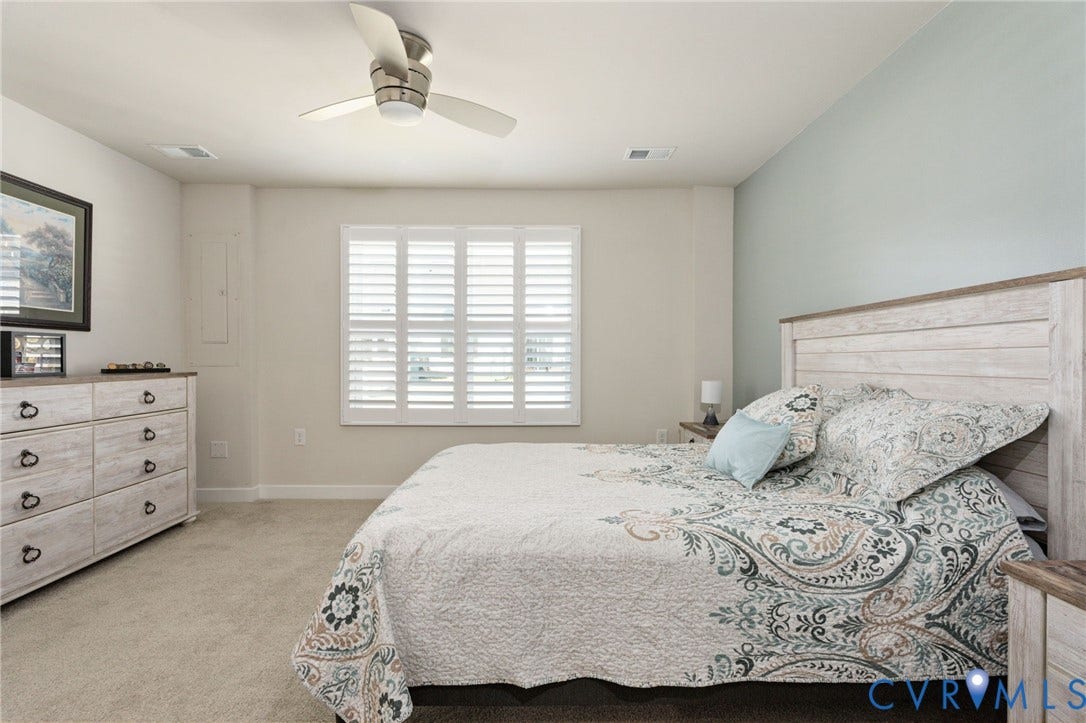 7236 George Wythe Lane, Summer Maple, New Kent, VA 23124 Carpeted room featuring a ceiling fan with integrated lighting, a window with plantation shutters, and light-toned walls