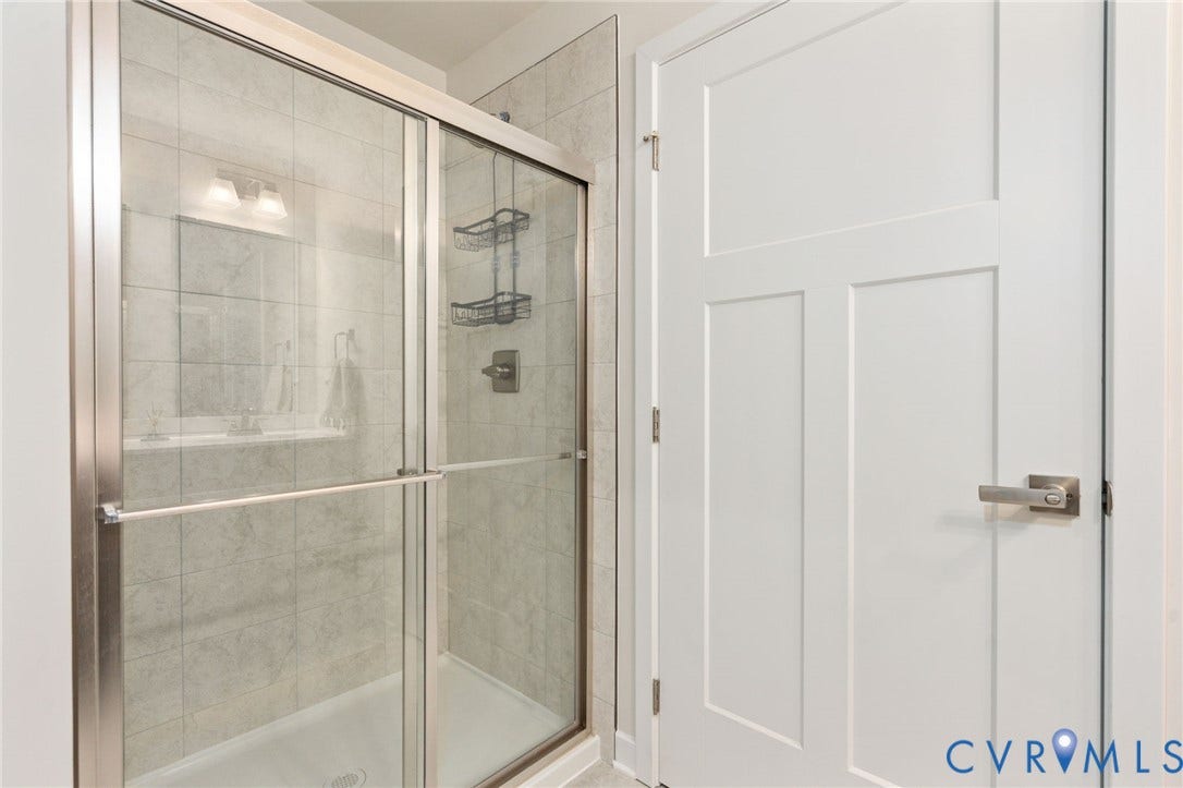 7236 George Wythe Lane, Summer Maple, New Kent, VA 23124 Walk-in shower with clear glass enclosure and brushed nickel hardware