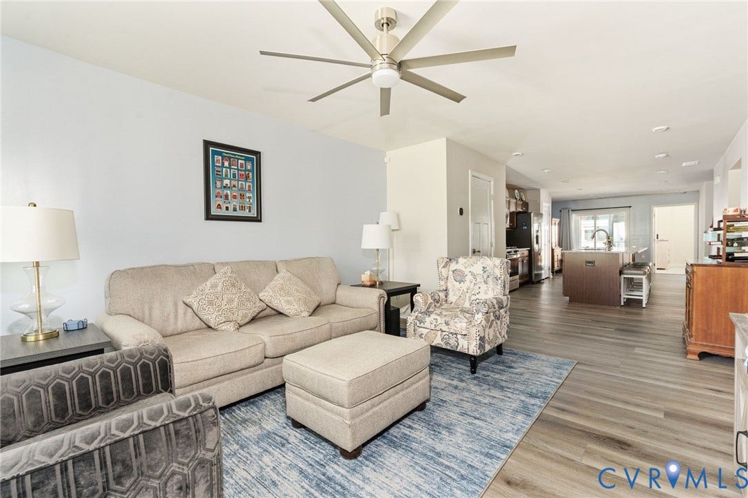7236 George Wythe Lane, Summer Maple, New Kent, VA 23124 Open-concept living area featuring wood-finish flooring throughout
