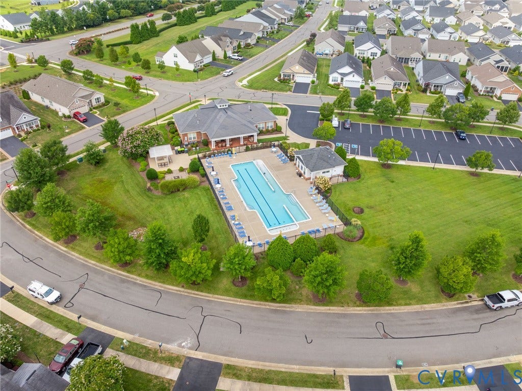7236 George Wythe Lane, Summer Maple, New Kent, VA 23124 Community pool with lap lanes and ample lounge seating, surrounded by extensive green space