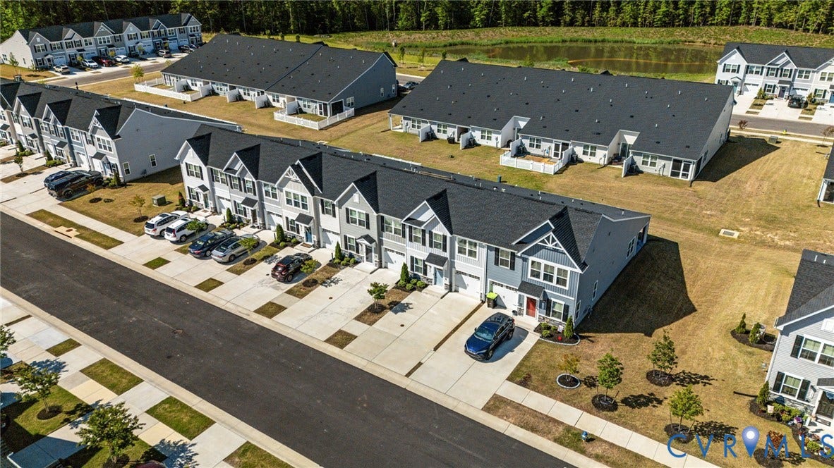 7236 George Wythe Lane, Summer Maple, New Kent, VA 23124 Contemporary townhome architecture featuring dark shingle roofs and light-toned siding