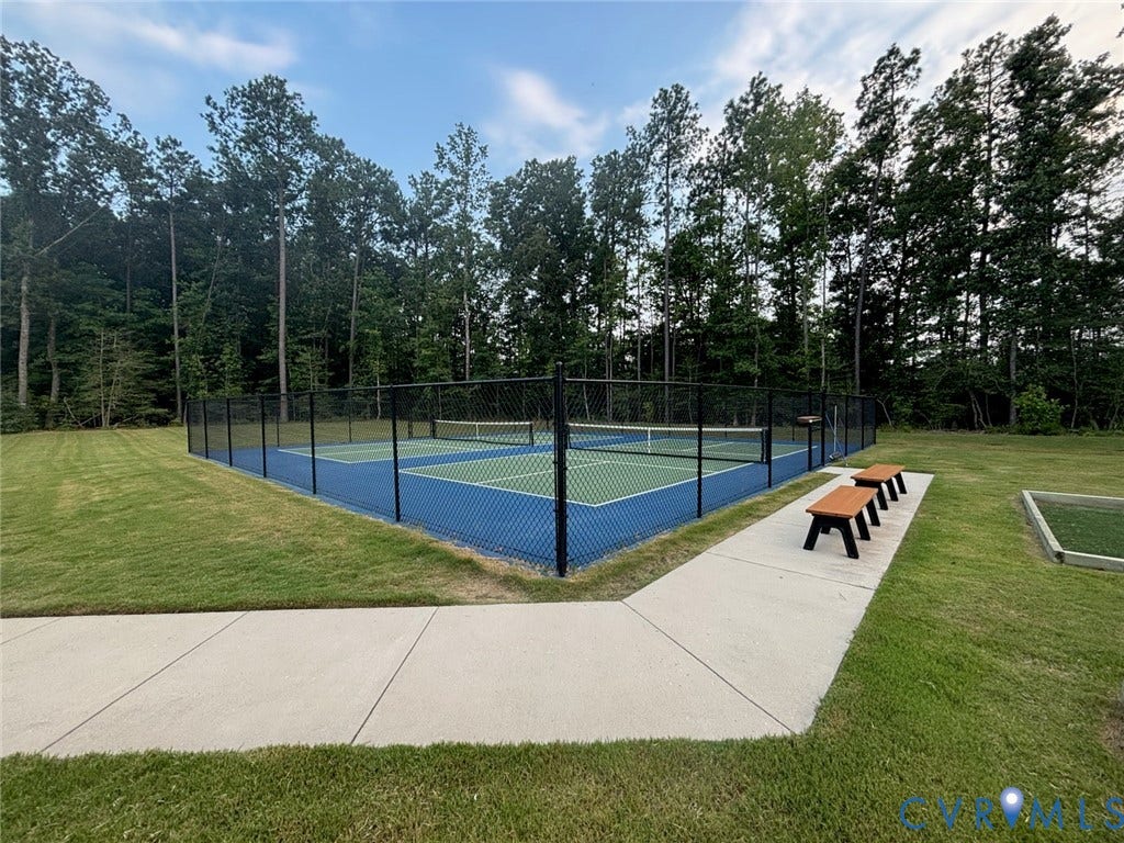 7236 George Wythe Lane, Summer Maple, New Kent, VA 23124 Fenced pickleball court featuring blue and green surfacing