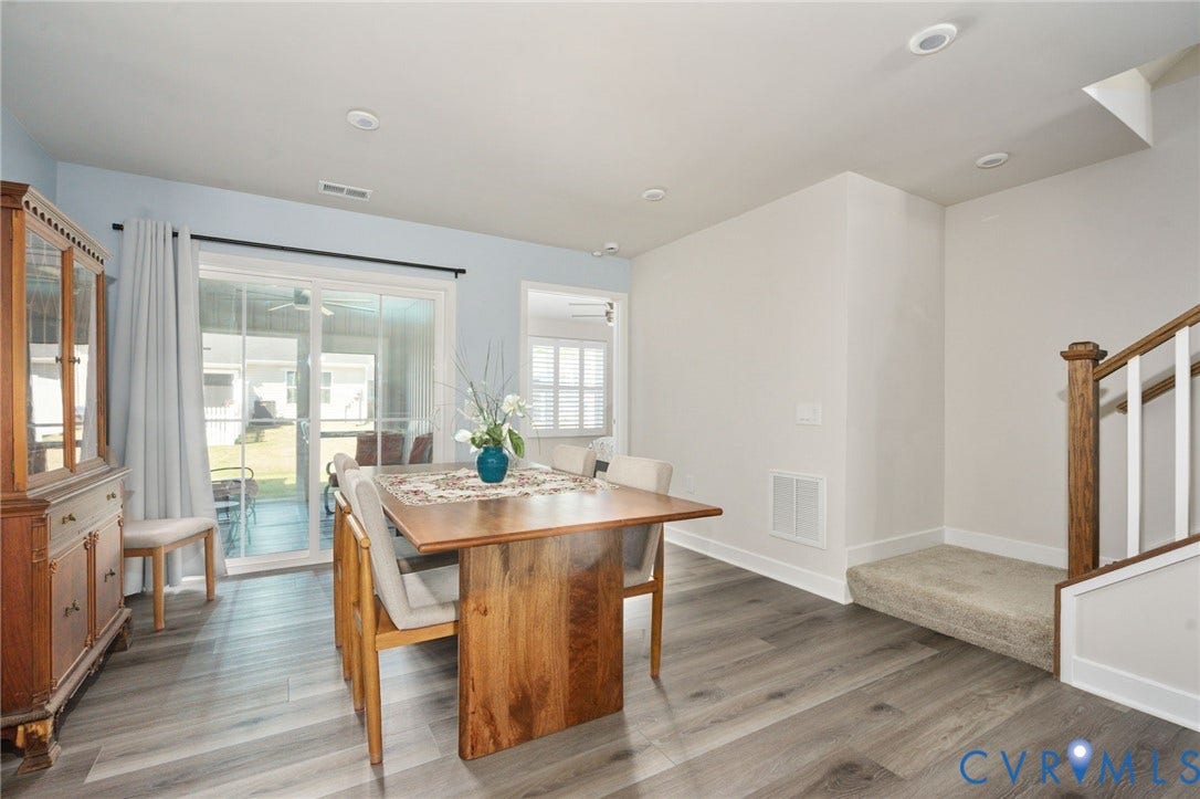 7236 George Wythe Lane, Summer Maple, New Kent, VA 23124 Interior space featuring wood-finish flooring, light blue and white wall tones, recessed lighting, and a staircase with a wood newel post and white balusters