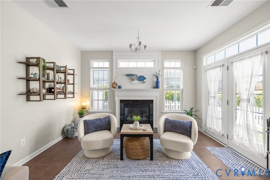 3105 Abruzzo Place, The Villas At Hunton Park, Glen Allen, VA 23059 Adorable sun room with shiplap surround and gas fireplace. Opens to the fenced backyard.