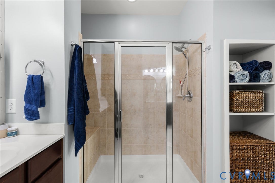 3105 Abruzzo Place, The Villas At Hunton Park, Glen Allen, VA 23059 Primary bath with shiplap wall, double vanities, tile flooring and walk in large tile shower.