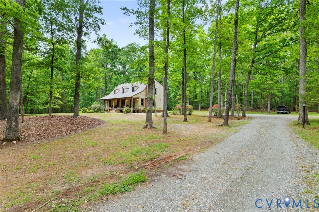 3172 Three Bridge Road, Powhatan, Powhatan, VA 23139 Massive front yard with gravel drive way and plenty of parking.