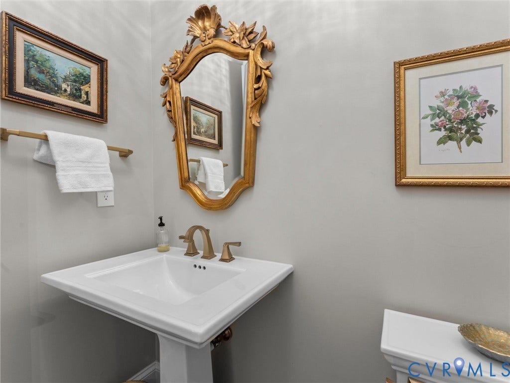 16131 Binley Road, Hallsley, Midlothian, VA 23112 Oversized pedestal sink. Comfort-height ammenities.