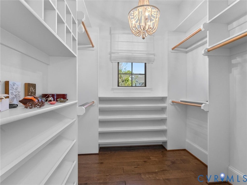 16131 Binley Road, Hallsley, Midlothian, VA 23112 7'1" X 10'10". Primary Bedroom walk-in closet 2. Includes a separate cedar-lined closet.