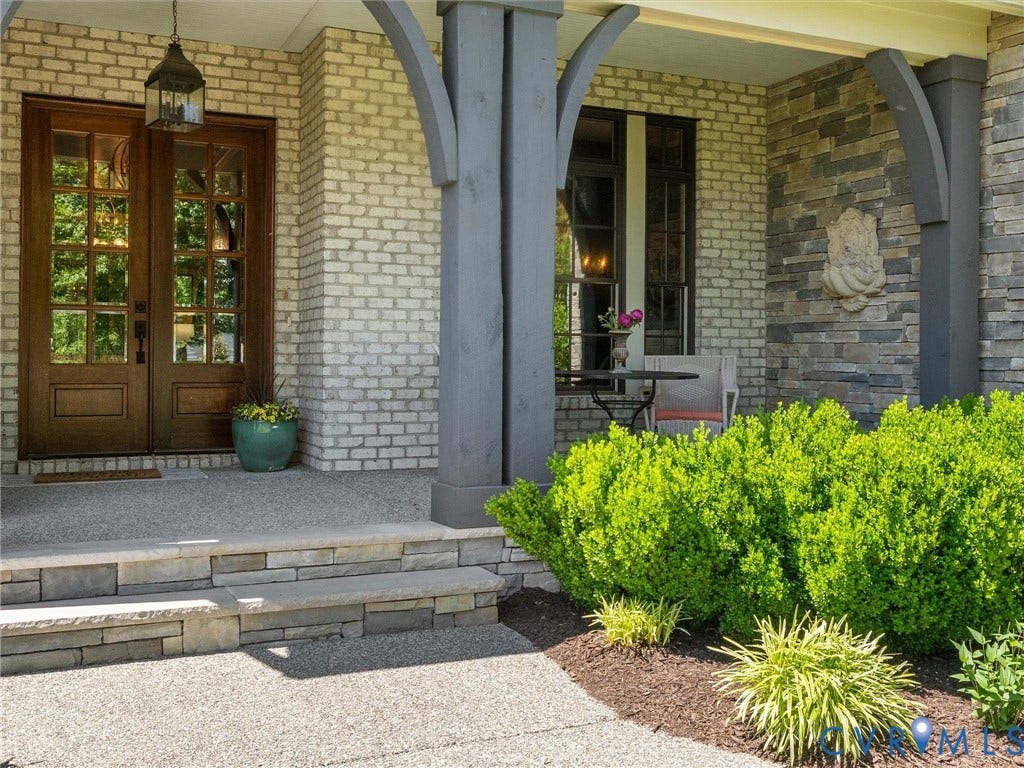 16131 Binley Road, Hallsley, Midlothian, VA 23112 A double wooden door entry impresses from the start.