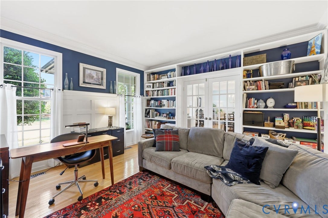 4909 Parsons Walk Place, Twin Hickory, Glen Allen, VA 23059 Living area featuring light wood-finish flooring and extensive built-in shelving