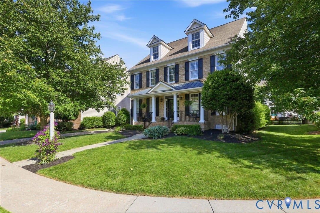 4909 Parsons Walk Place, Twin Hickory, Glen Allen, VA 23059 Traditional brick-front home with a covered front porch featuring white columns and black railings