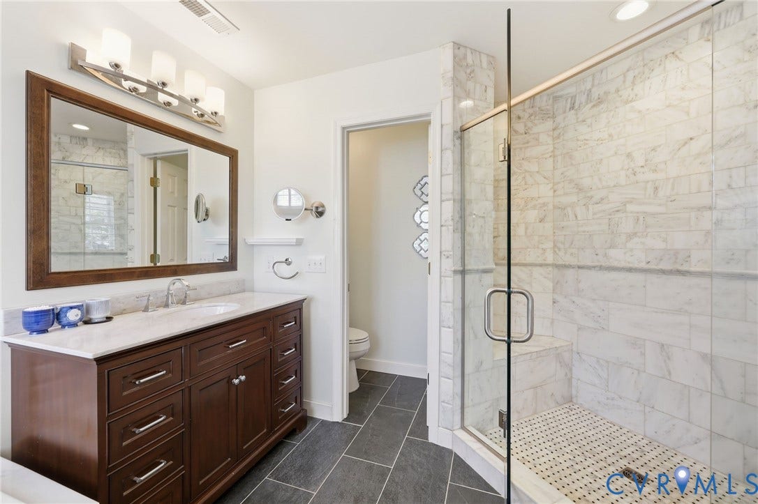4909 Parsons Walk Place, Twin Hickory, Glen Allen, VA 23059 Spacious bathroom featuring a large shower enclosure with a built-in bench and glass door
