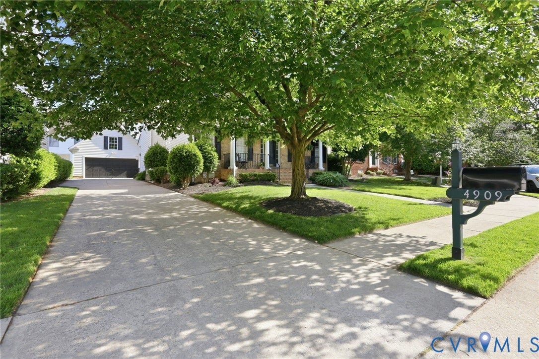 4909 Parsons Walk Place, Twin Hickory, Glen Allen, VA 23059 Expansive concrete driveway framed by manicured lawns and mature trees