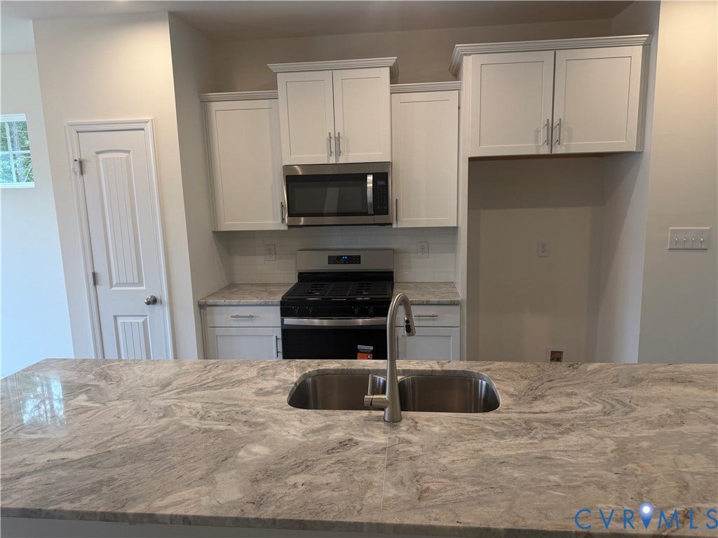 This home is MOVE-IN READY! The photo represents the actual home.