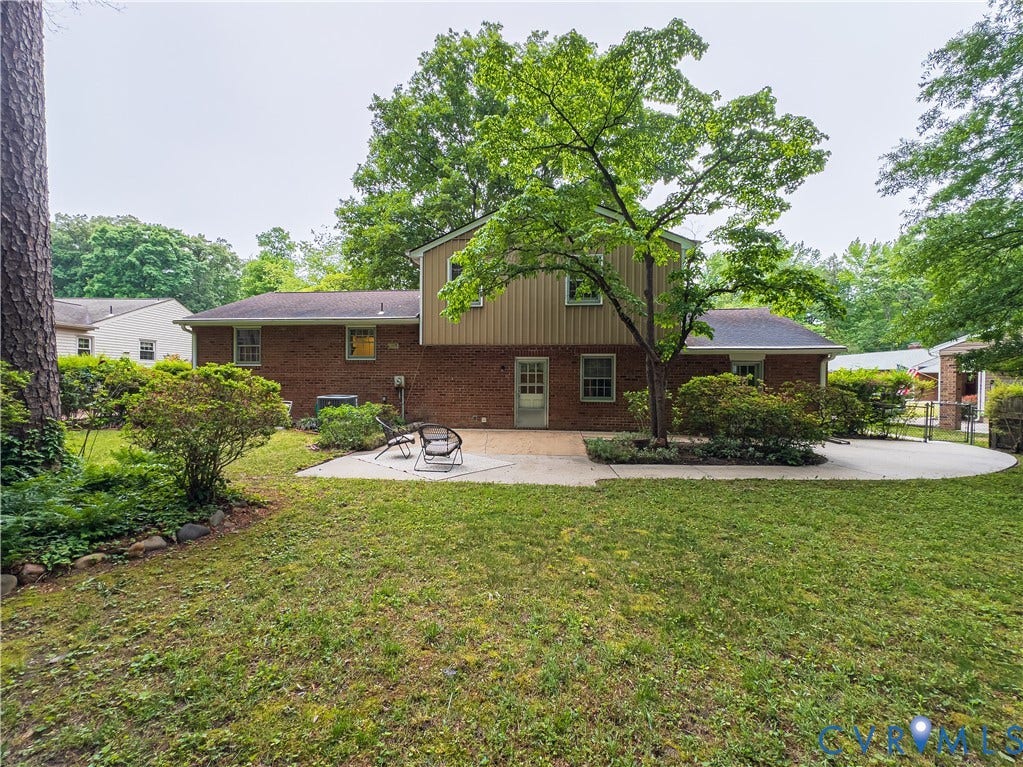 Spacious back yard with dedicated patio space