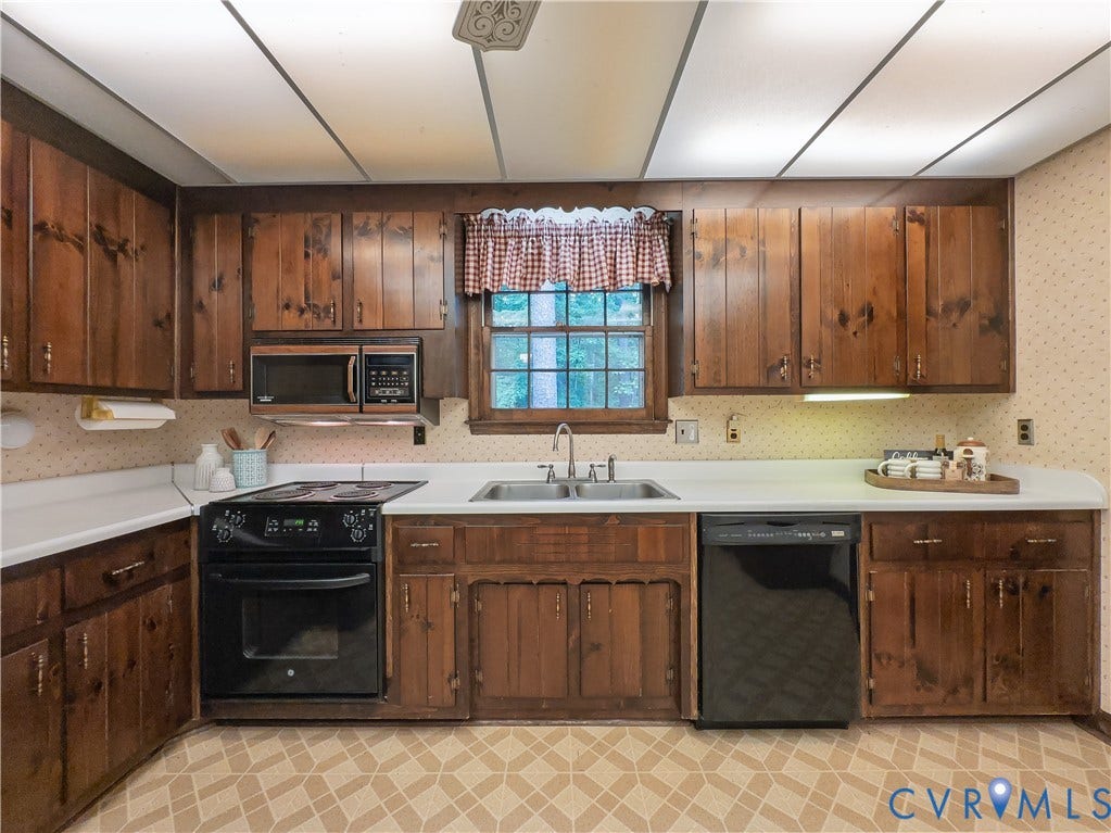 Kitchen with abundant cabinetry and storage