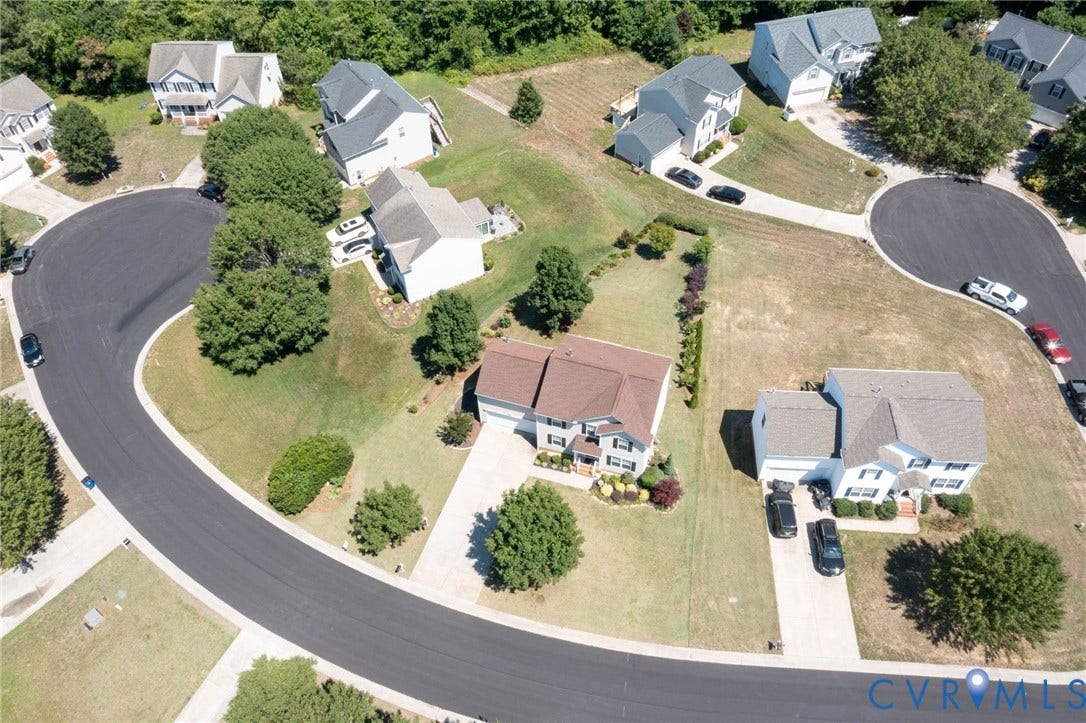 Aerial perspective showcasing a residential cul-de-sac
