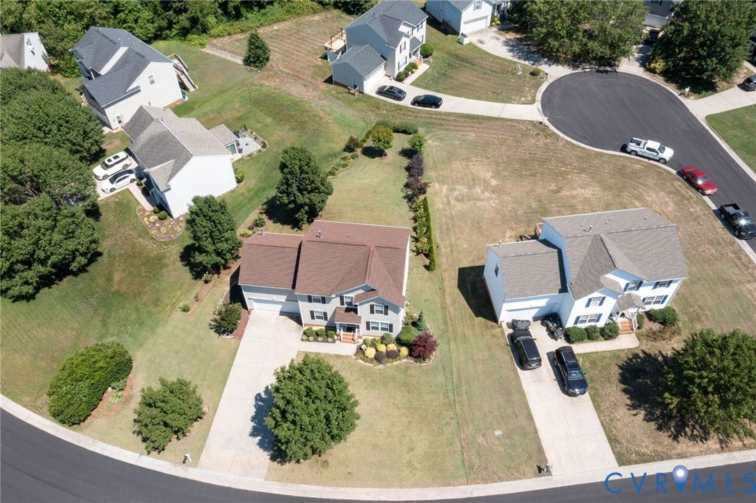 Aerial overview of a residential neighborhood featuring a cul-de-sac