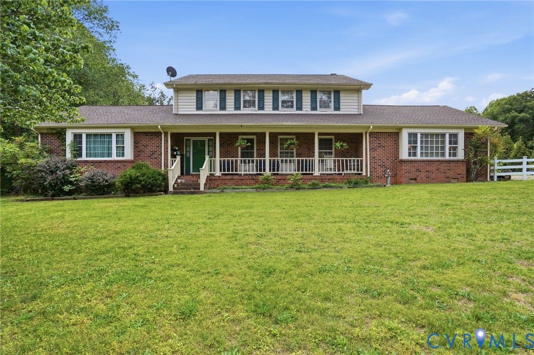 11016 Pridesville Road, Amelia, VA 23002 Brick and siding exterior with a covered front porch featuring white railing