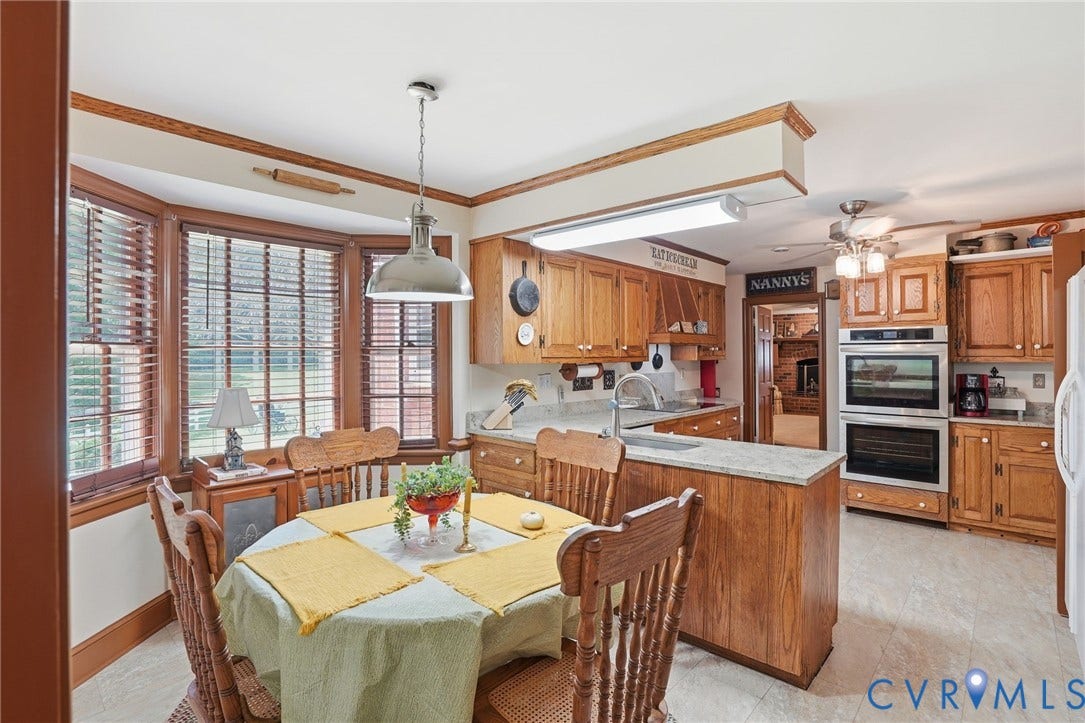 11016 Pridesville Road, Amelia, VA 23002 Kitchen featuring an integrated dining area with a bay window