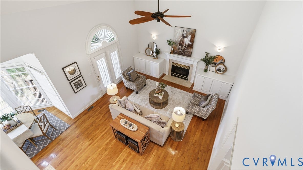 12400 Chadsworth Place, Wyndham, Glen Allen, VA 23059 Two-story living area with high ceilings, wood-finish flooring, and a ceiling fan