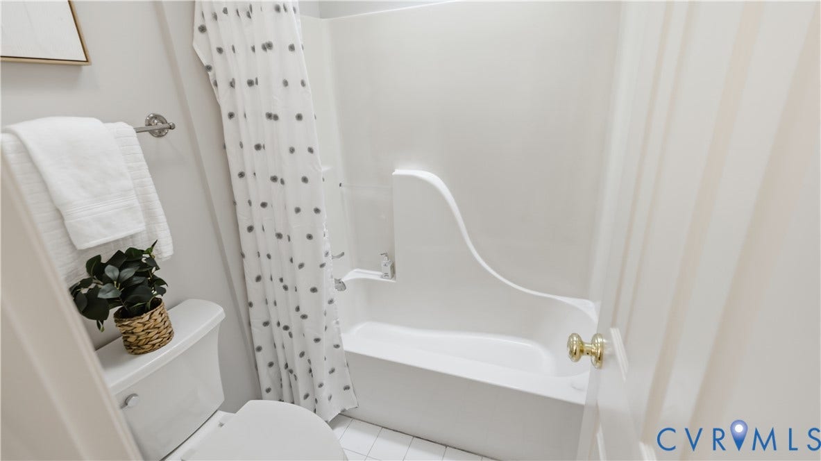 12400 Chadsworth Place, Wyndham, Glen Allen, VA 23059 Bathroom featuring a white bathtub and shower combination with an integrated seat
